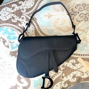 All black Dior Saddle Bag. Orig. $4,200. THIS IS A STEAL!! My loss ur gain!